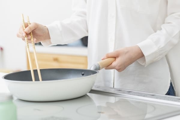 料理をする人